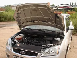 Упор капота Ford Focus II
